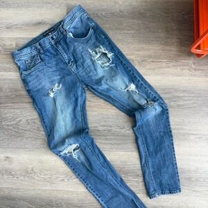 Empyre blue jeans with ripped details, size 34